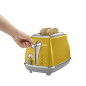 Toaster DELONGHI ICONA CAPITALS 2 tranches - 900W - Grille pain 3 fonctions - Chauffe viennoisseries inclus - Jaune